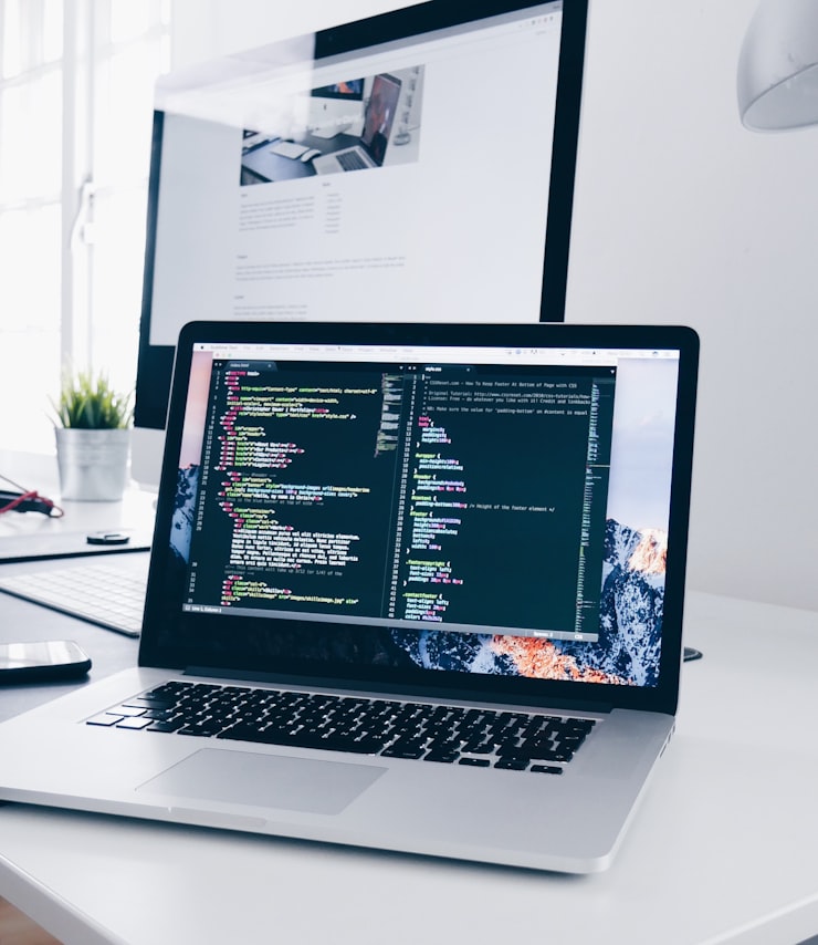 Web developer working on laptop